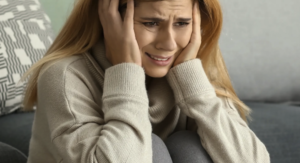 Woman in pain from hydrocodone withdrawal.